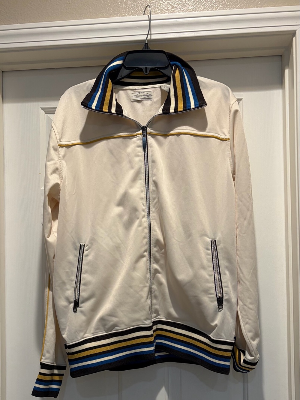 Eighty Eight Cream Track Jacket with Blue, Navy & Gold Stripe Trim